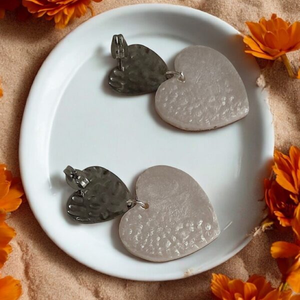 L'éclat de l'acier rencontre la douceur du papier Washi dans un duo de cœurs solaires