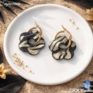 Découvrez les capucine Créoles Réversibles zébré doré pour changer de style en un geste. Un bijou artisanal, audacieus et léger.